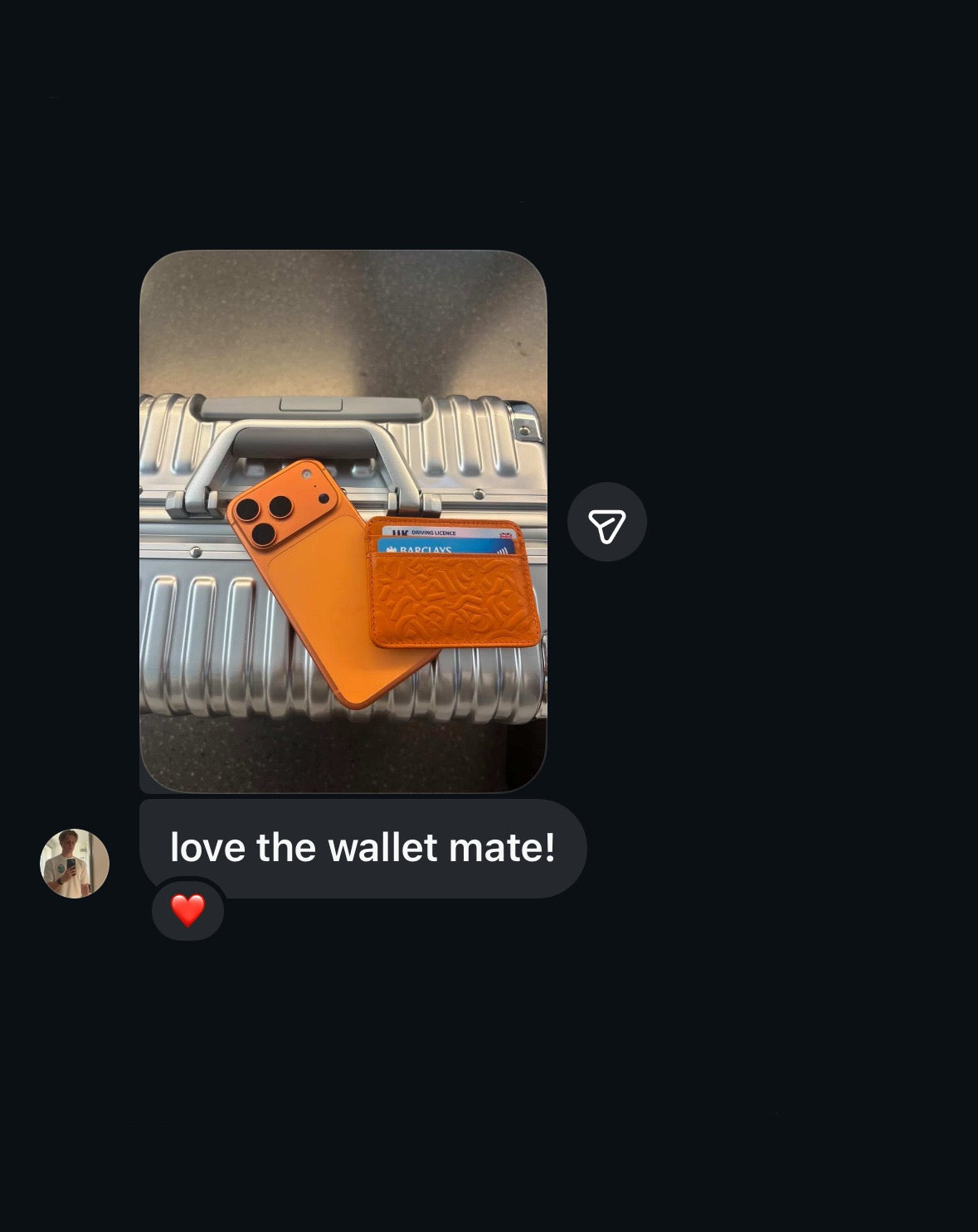 Customer holding Kade & Co wallet in car